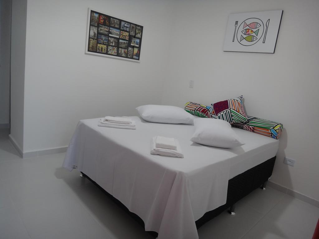 Urbano Suites Убатуба Стая снимка